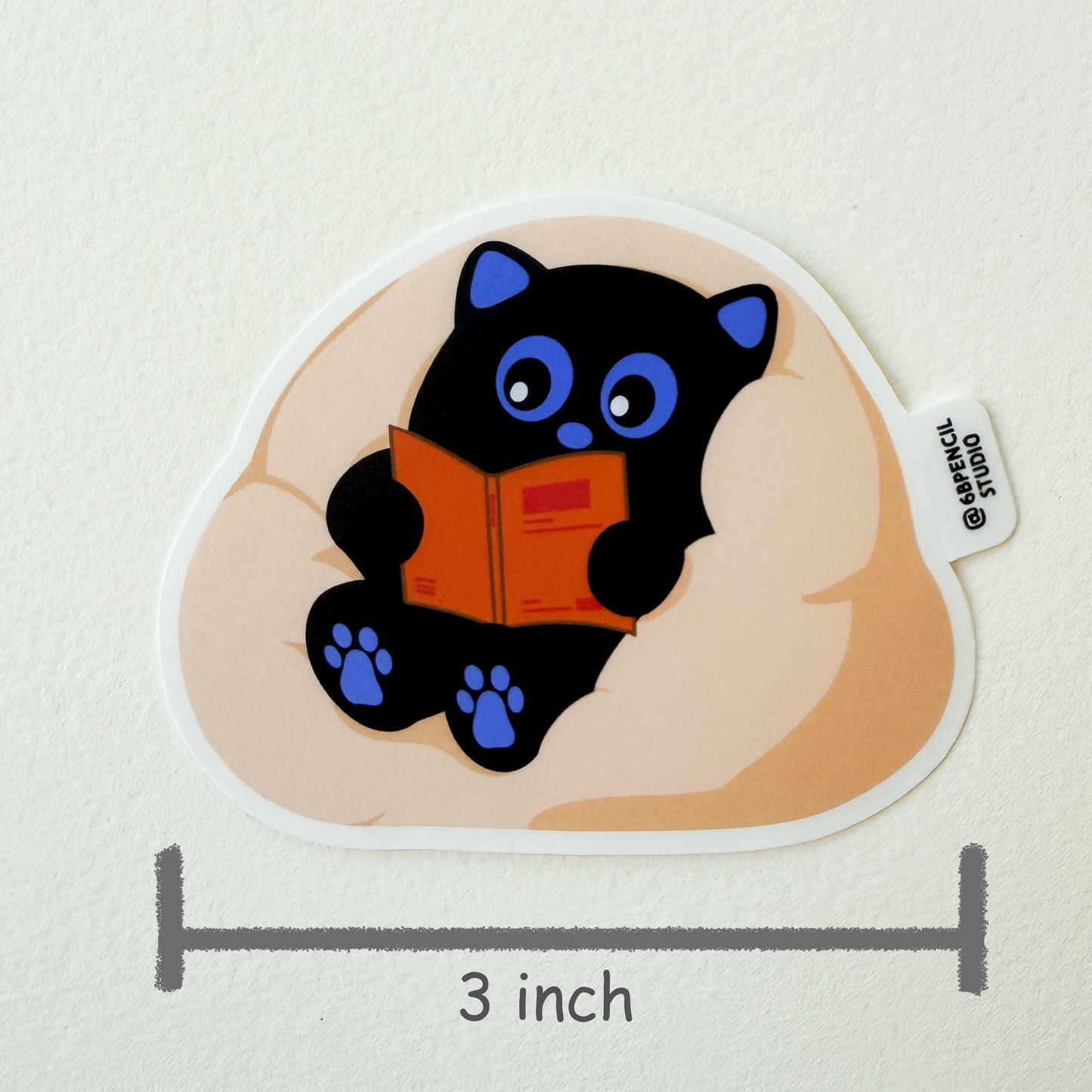 Tomo Cat - Cozy Black Cat Sticker β Cute Bean Bag Cat with Reading or Gaming Design Options - Black Cat Sticker